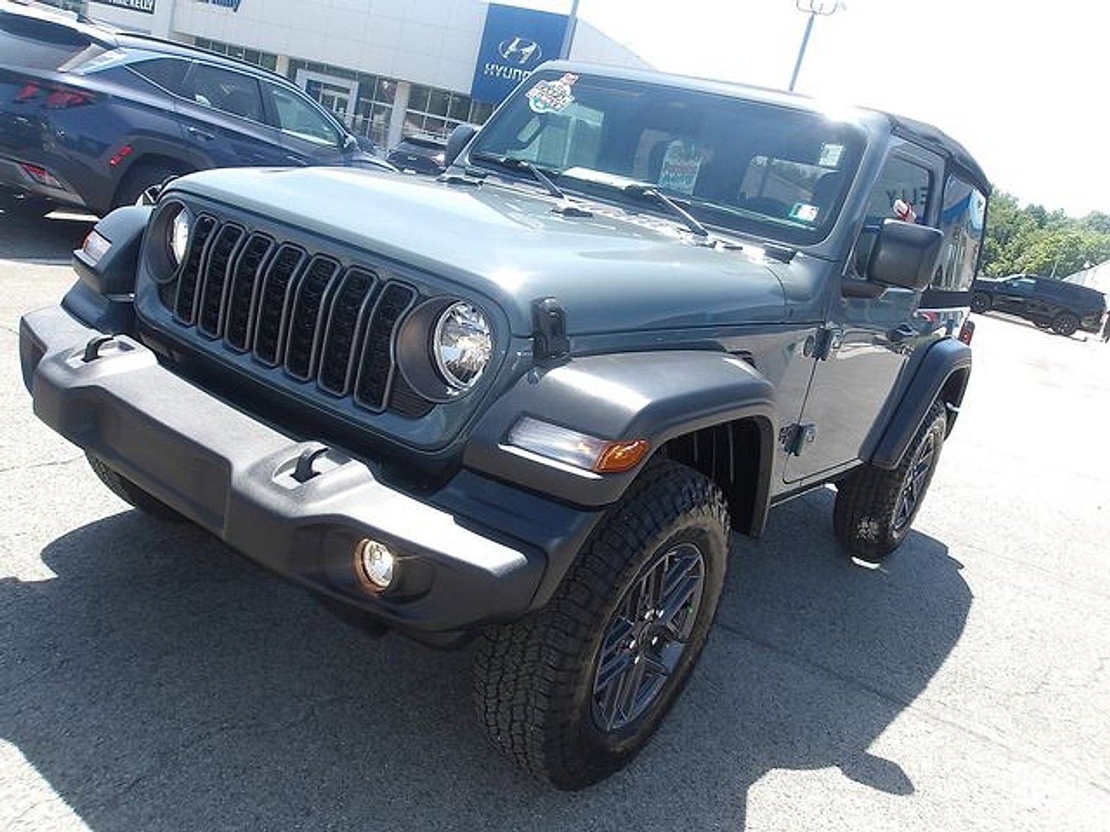 2025 Jeep Wrangler — rear three-quarter view