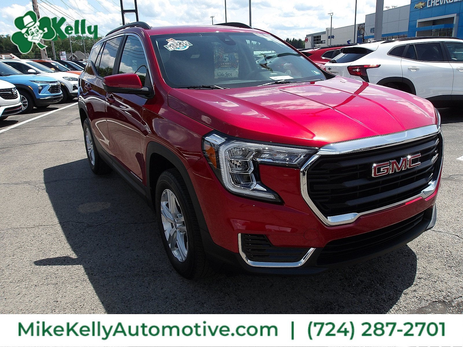2023 GMC Terrain SLE in Volcanic Red Tintcoat — front three-quarter view