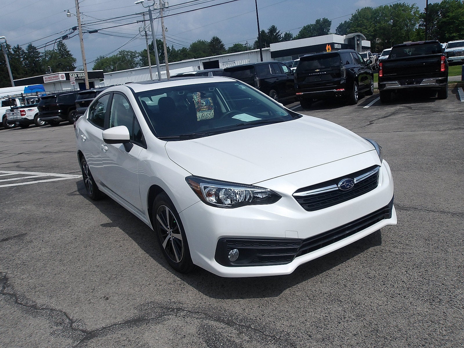 2020 Subaru Impreza Premium in Crystal White Pearl — front three-quarter view