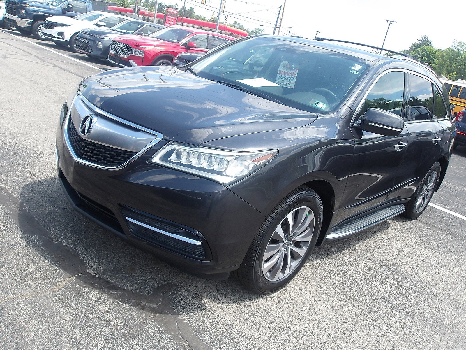 2016 Acura MDX — rear three-quarter view