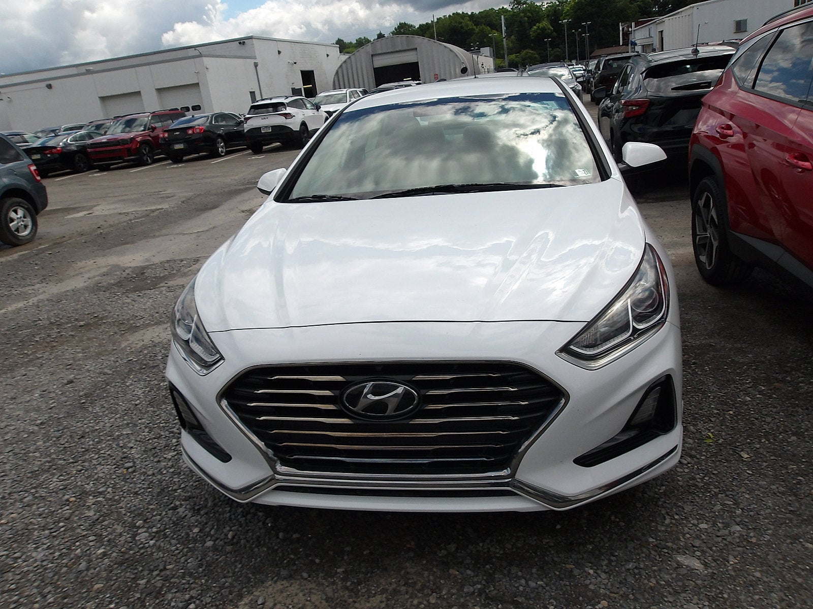 2018 Hyundai SONATA SE in Quartz White Pearl — front three-quarter view