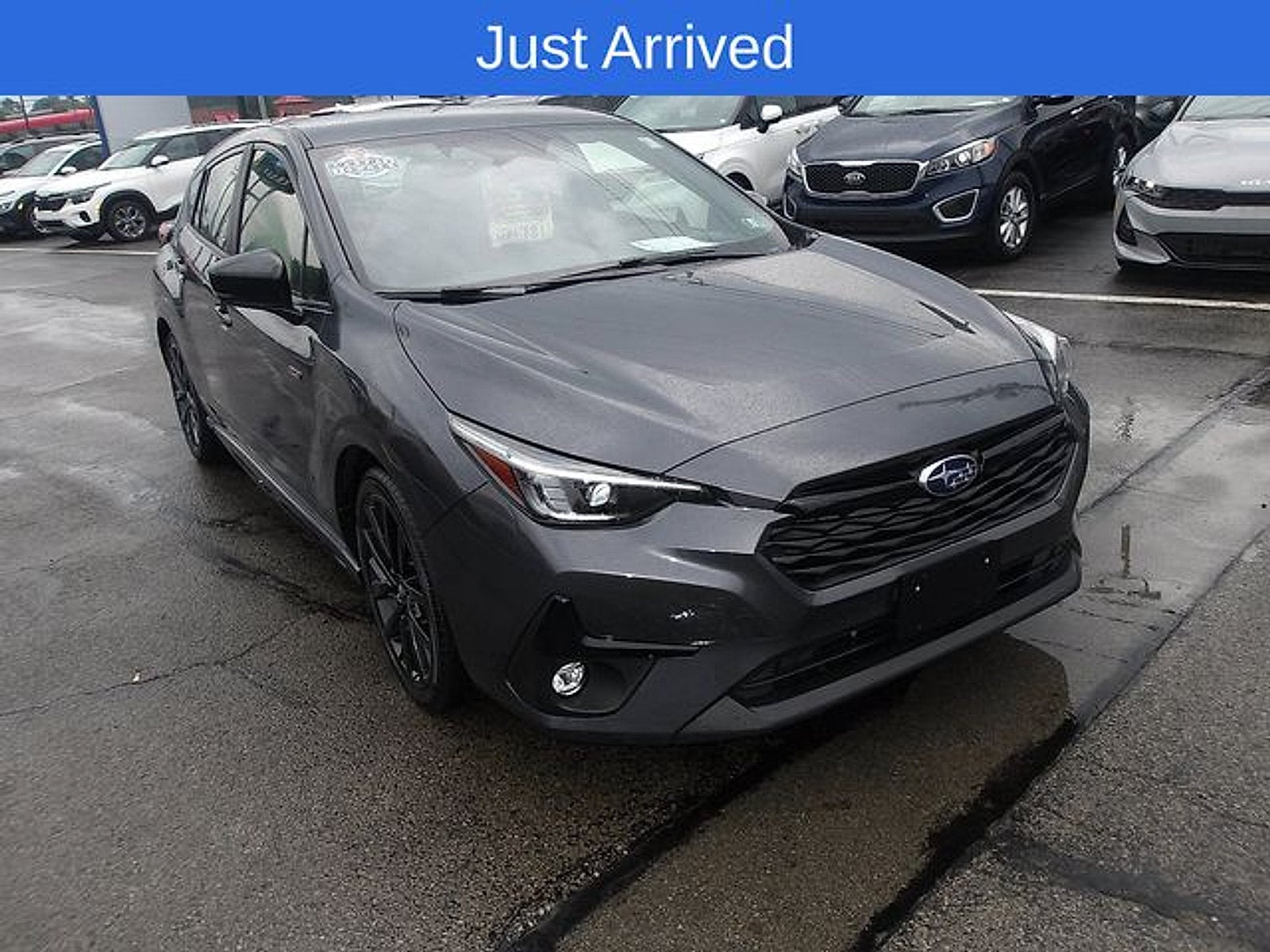 2024 Subaru Impreza RS in Magnetite Gray Metallic — front three-quarter view