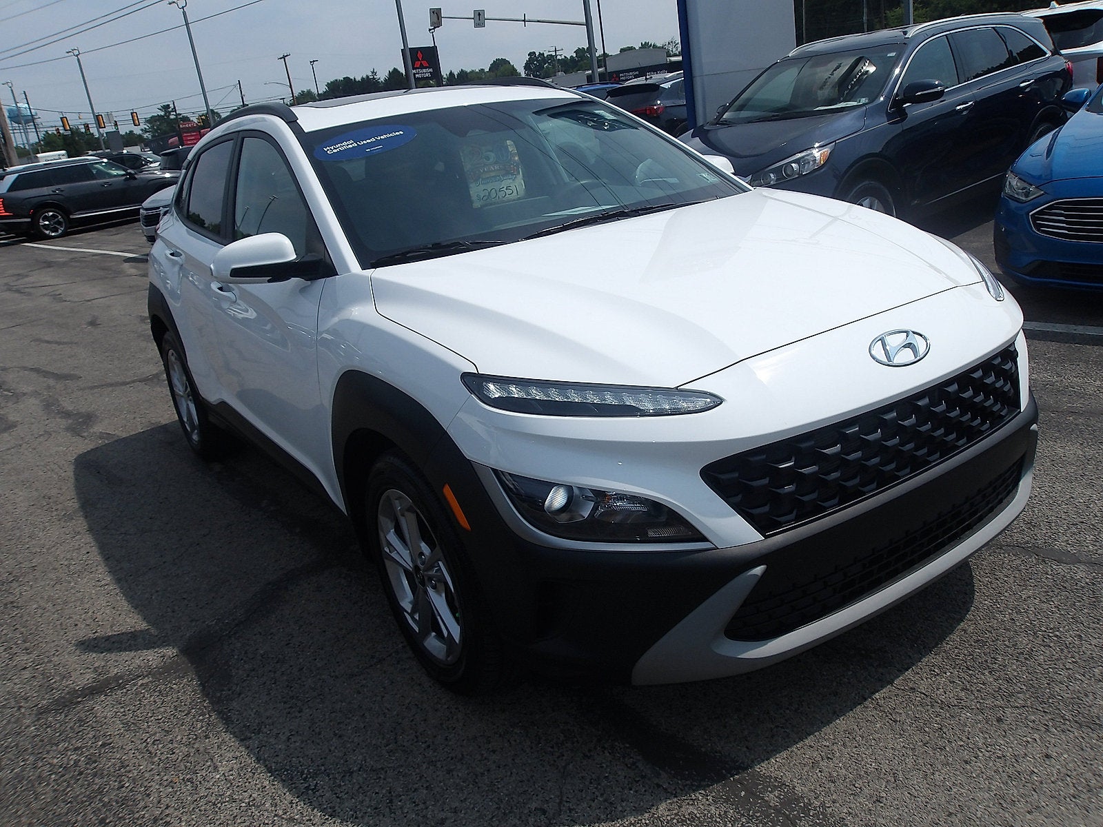 2023 Hyundai KONA SEL in Lunar White — front three-quarter view