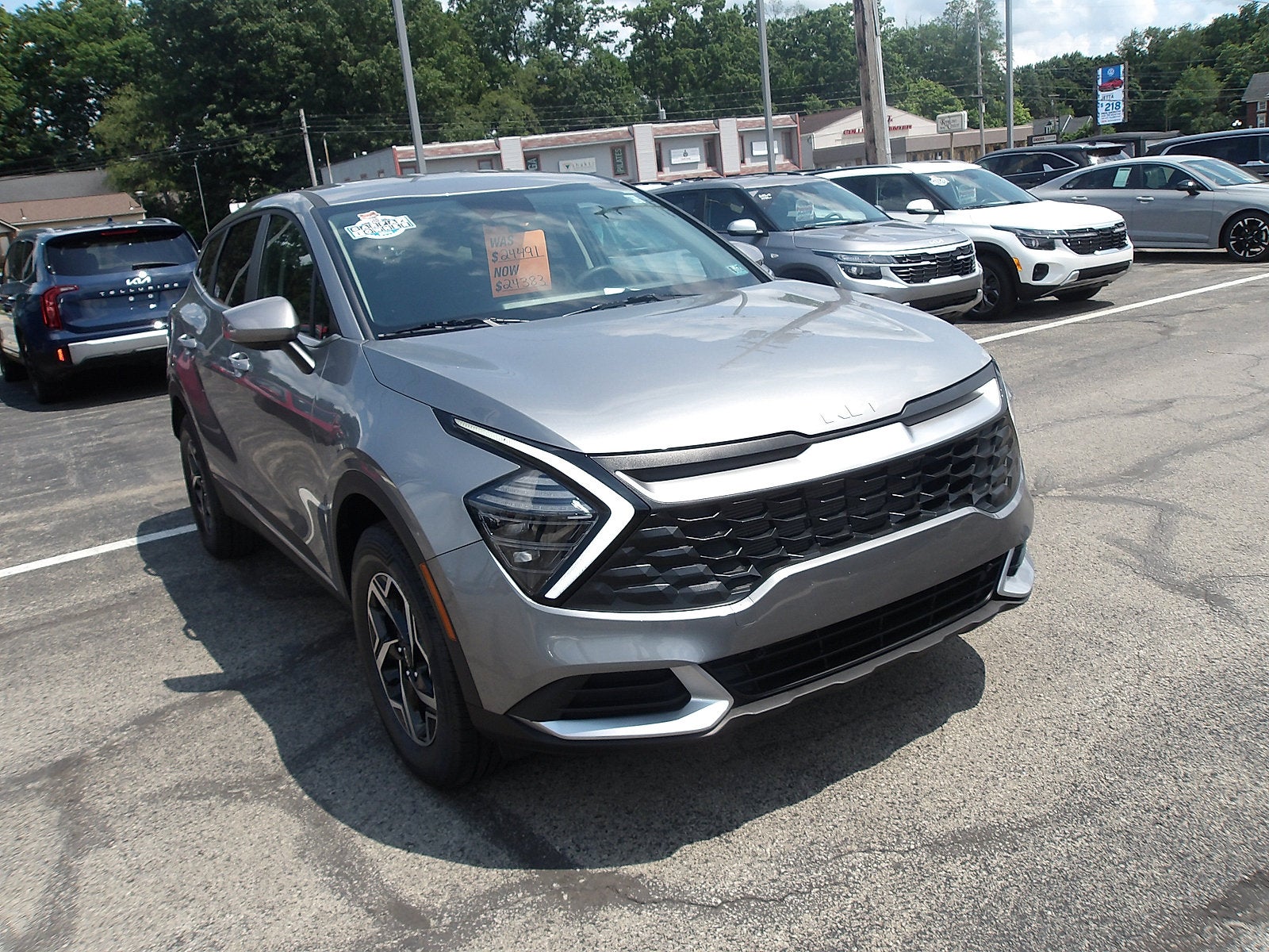 2025 Kia Sportage LX in Steel Gray — front three-quarter view